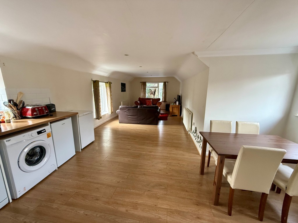 Lot: 84 - HIGH STREET INVESTMENT WITH POTENTIAL - Flat 5 living and kitchen area